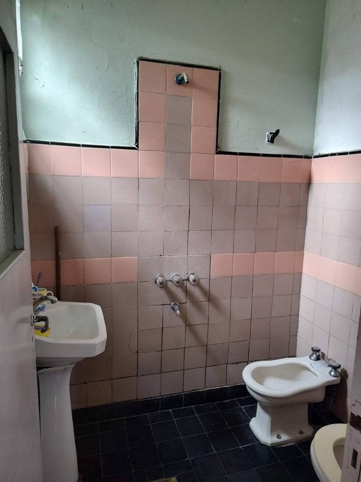 Terreno con vivienda en Venta
