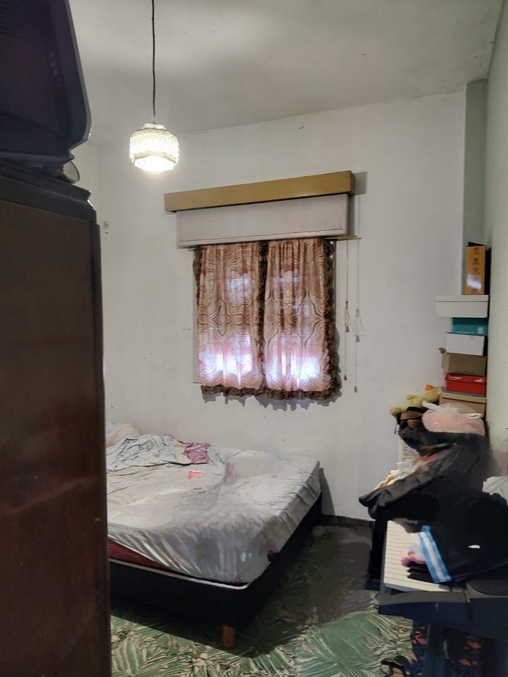 Terreno con vivienda en Venta