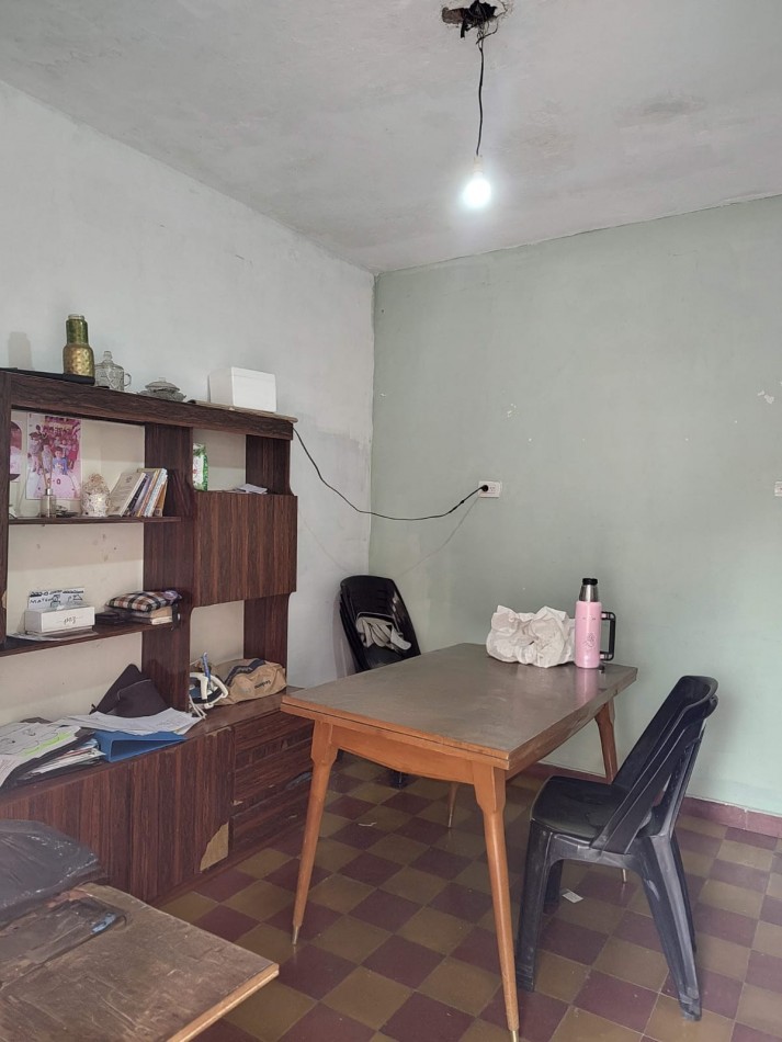 Terreno con vivienda en Venta