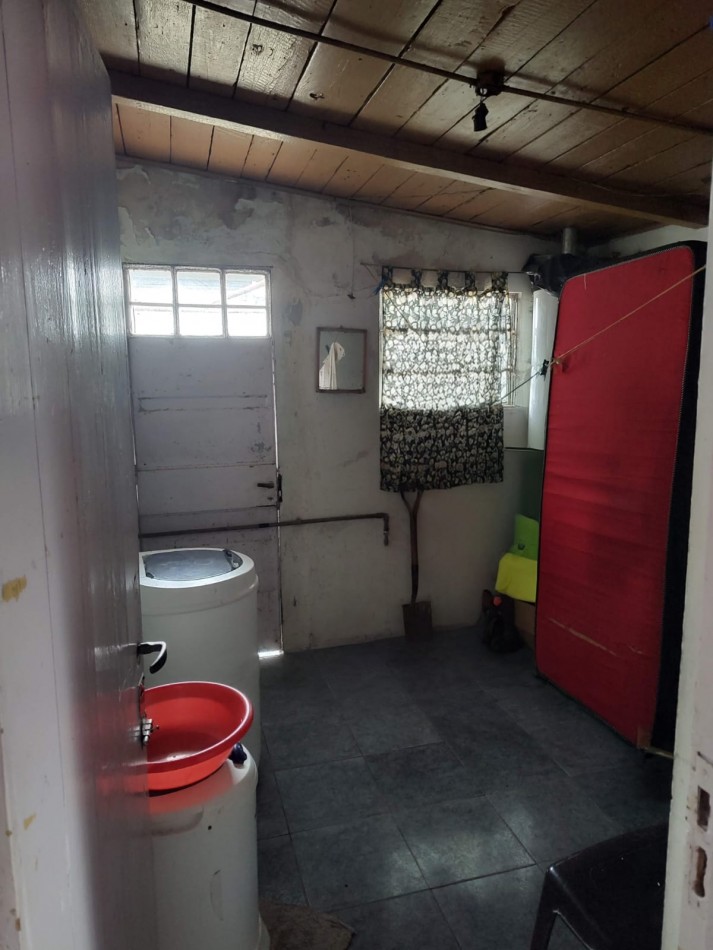 Terreno con vivienda en Venta