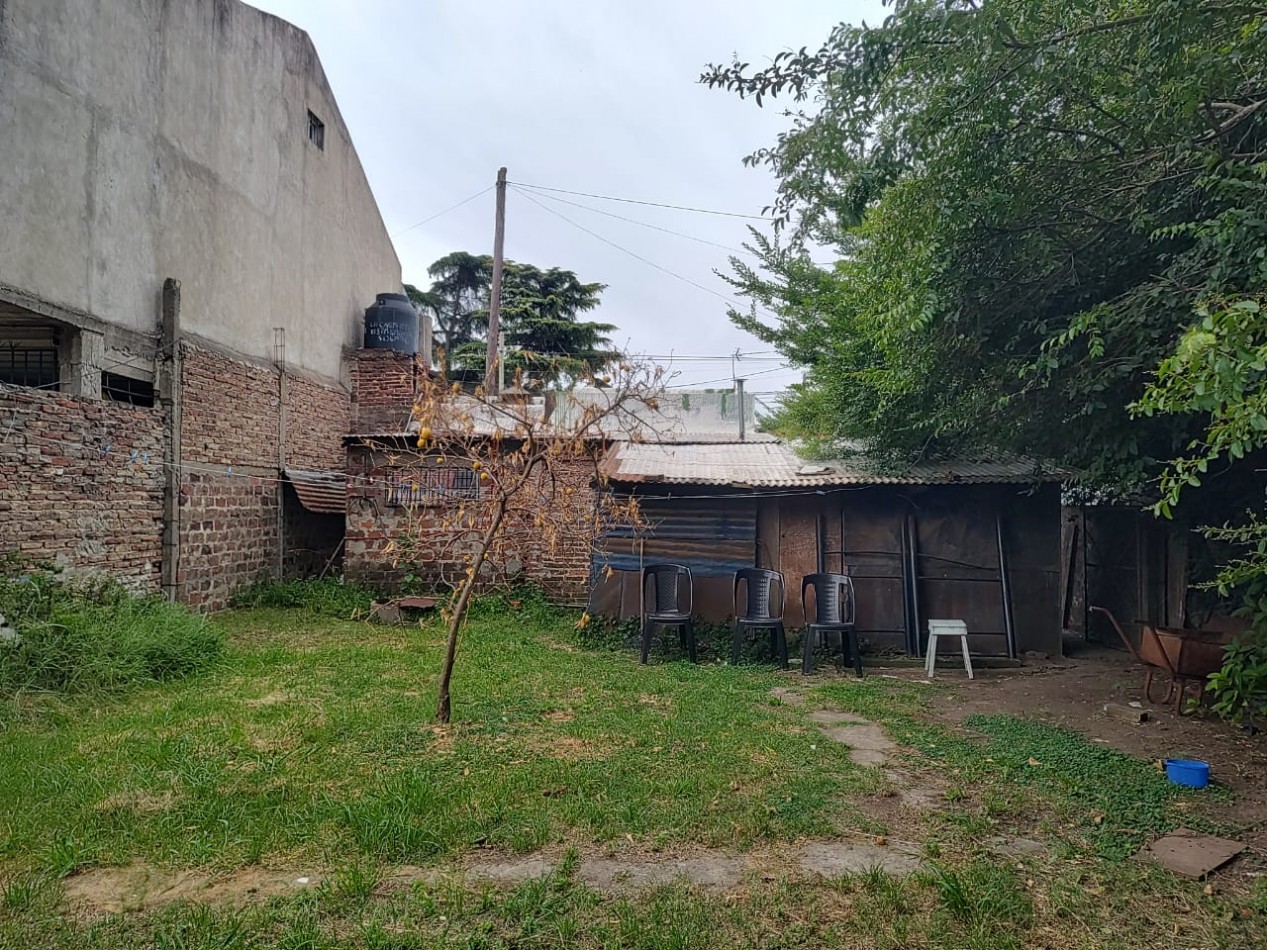 Terreno con vivienda en Venta